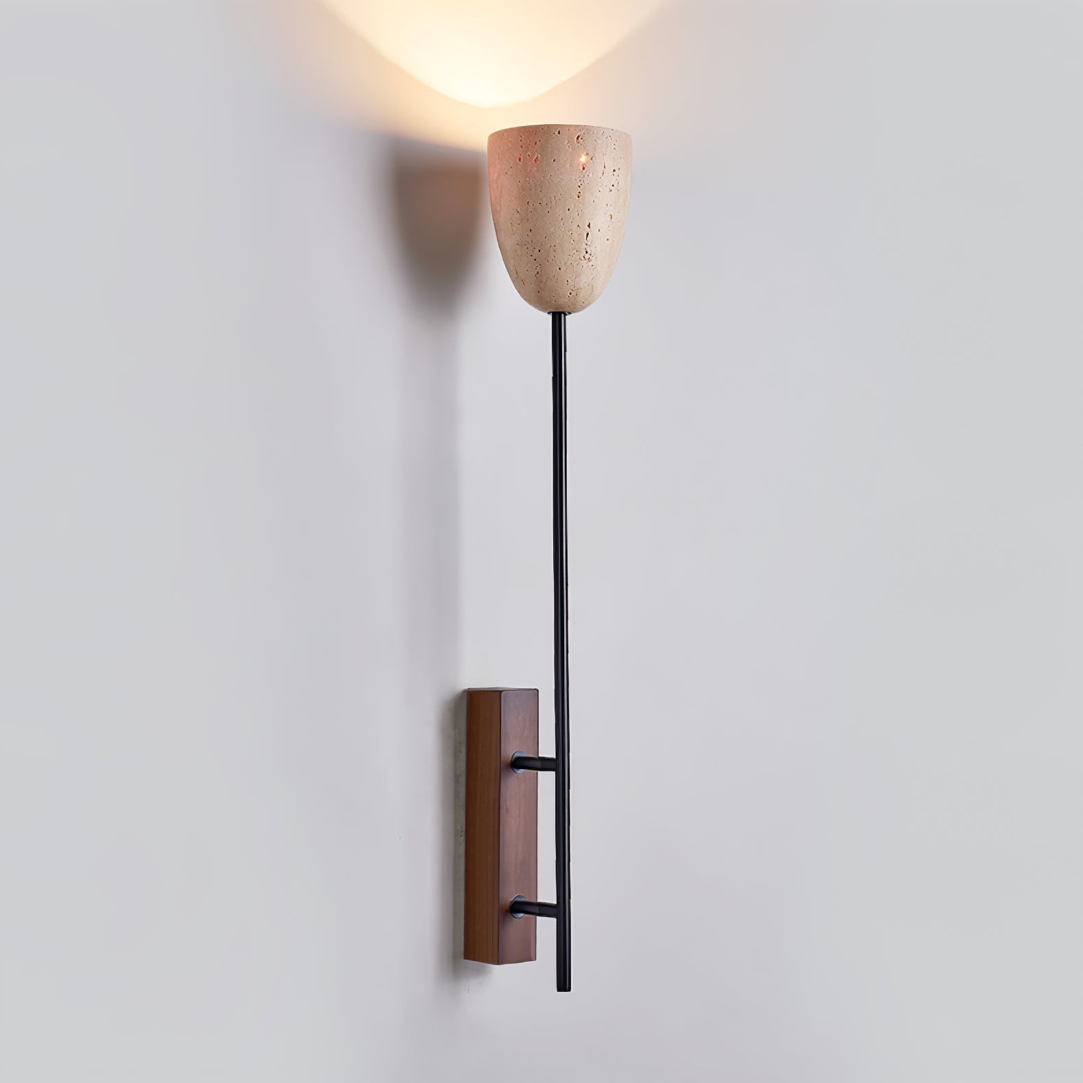 Side view of travertine lighting fixture for scale and shape reference