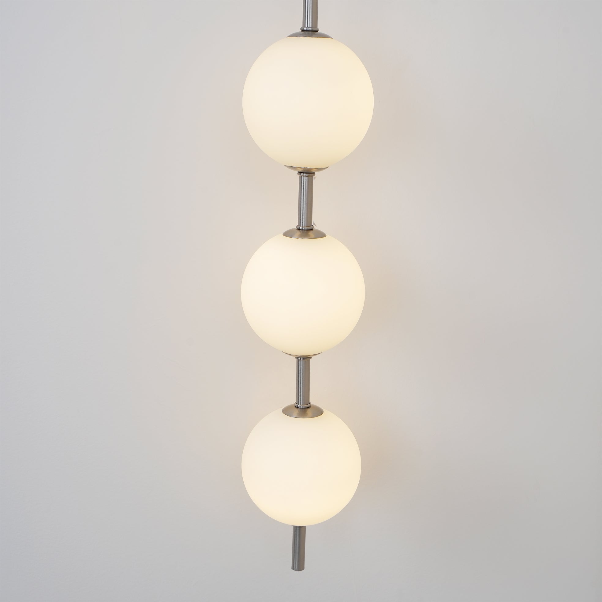 Vertical Globe Plug-in Wall Sconce