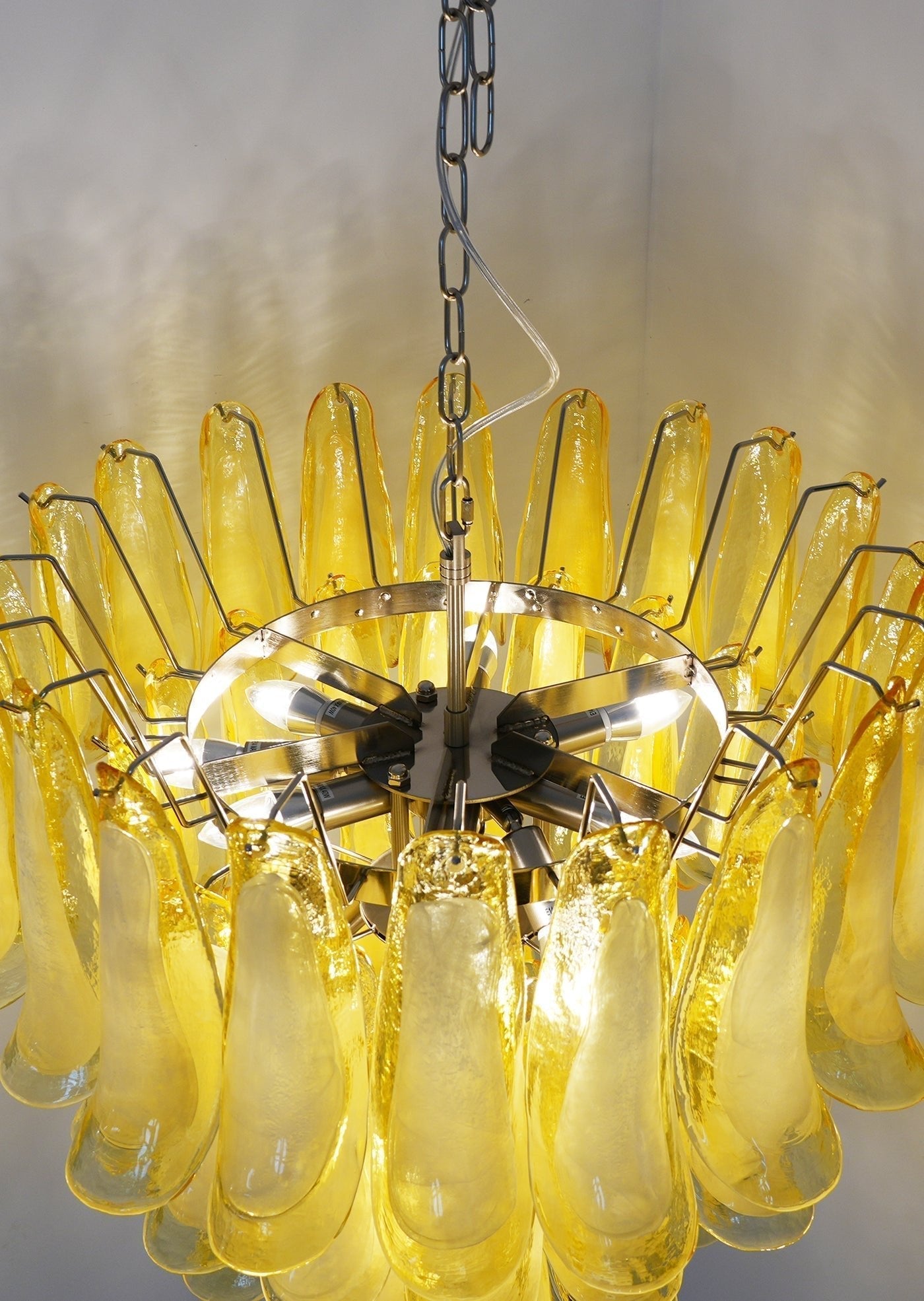 Side view of glass chandelier for scale and shape reference