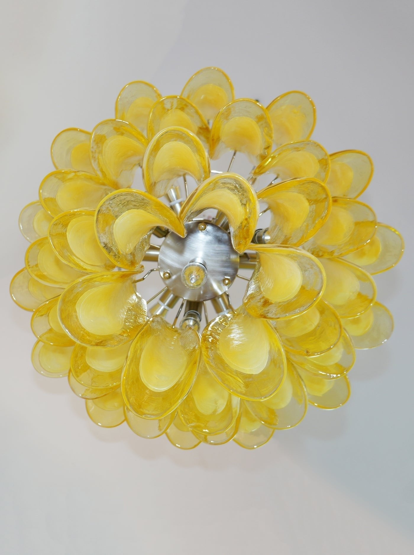 Side view of glass chandelier for scale and shape reference