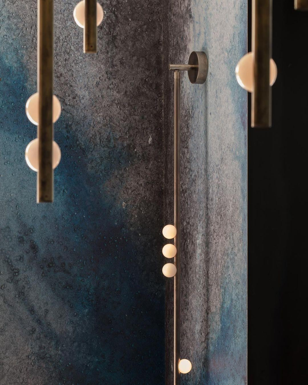 glass vanity light shown as a main product image for bathroom mirrors