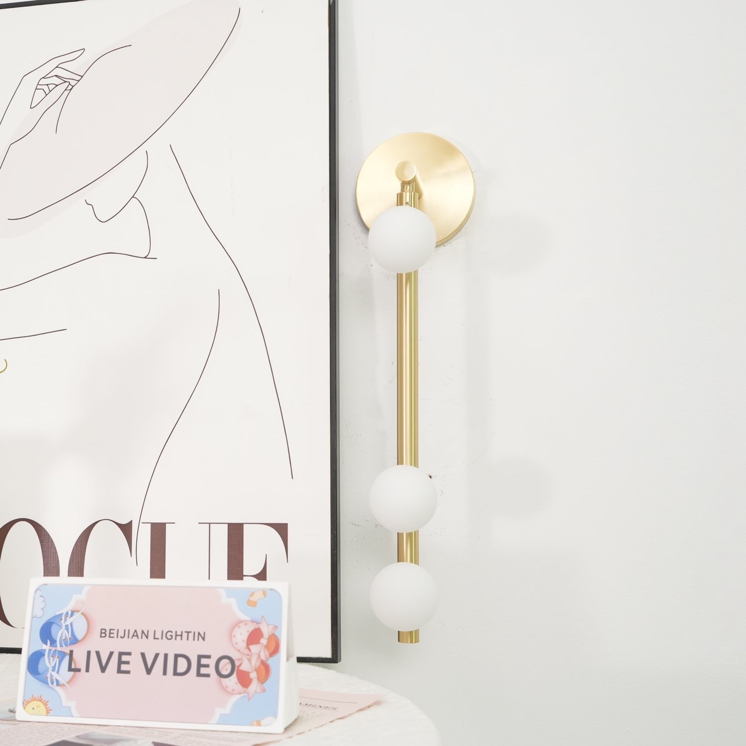 Close-up angle of Brass Halo Tube Wall Light Vanity Light showing form and material detail