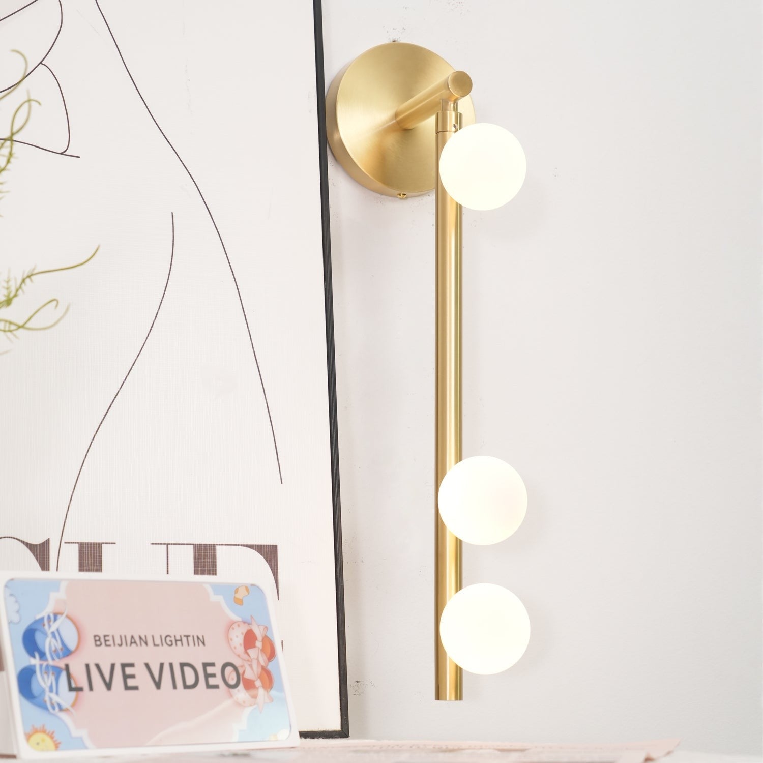 Close-up angle of Brass Halo Tube Wall Light Vanity Light showing form and material detail