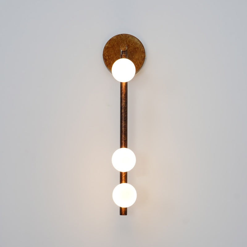 Close-up angle of Brass Halo Tube Wall Light Vanity Light showing form and material detail