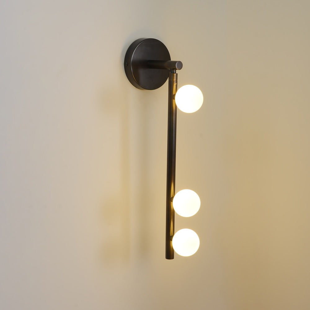 Close-up angle of Brass Halo Tube Wall Light Vanity Light showing form and material detail